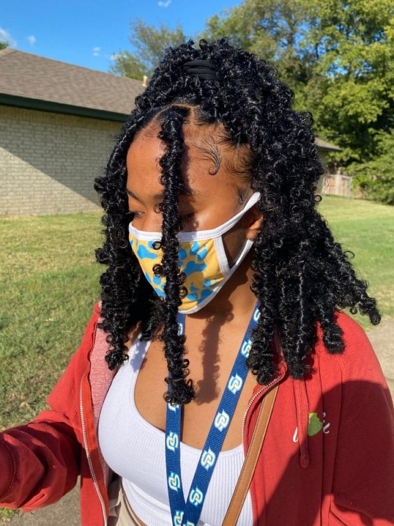 someone with butterfly locs protective styles