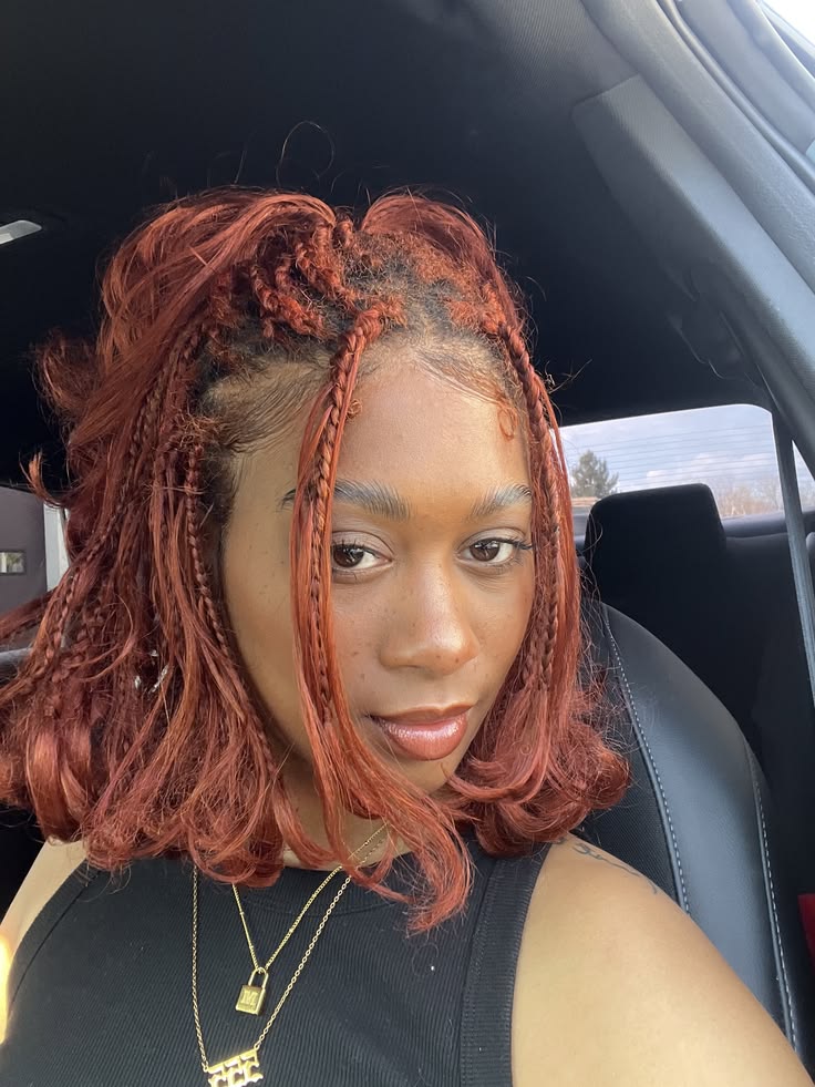 someone with copper  braids