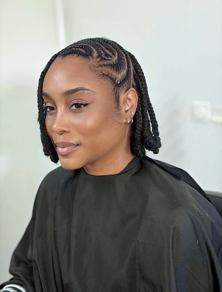 someone with cornrow bob