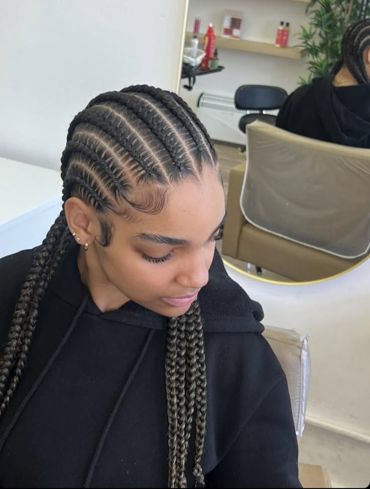 someone with cornrows straight back afro hairstyles