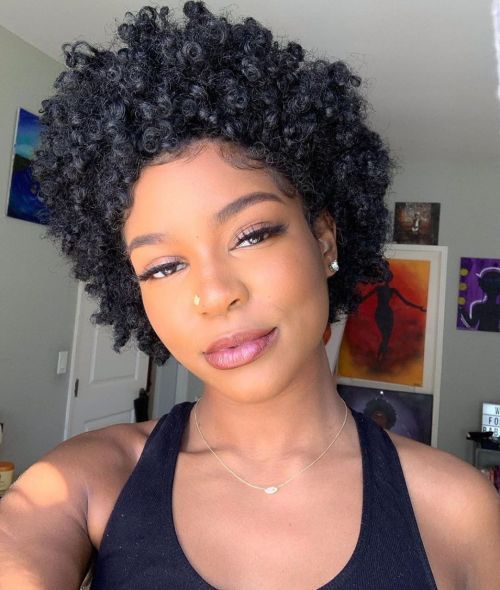 someone with curly afro