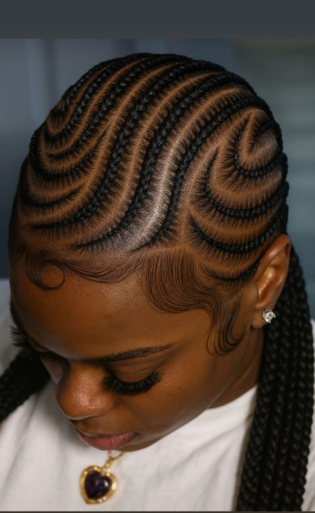 someone with curved cornrows design protective styles