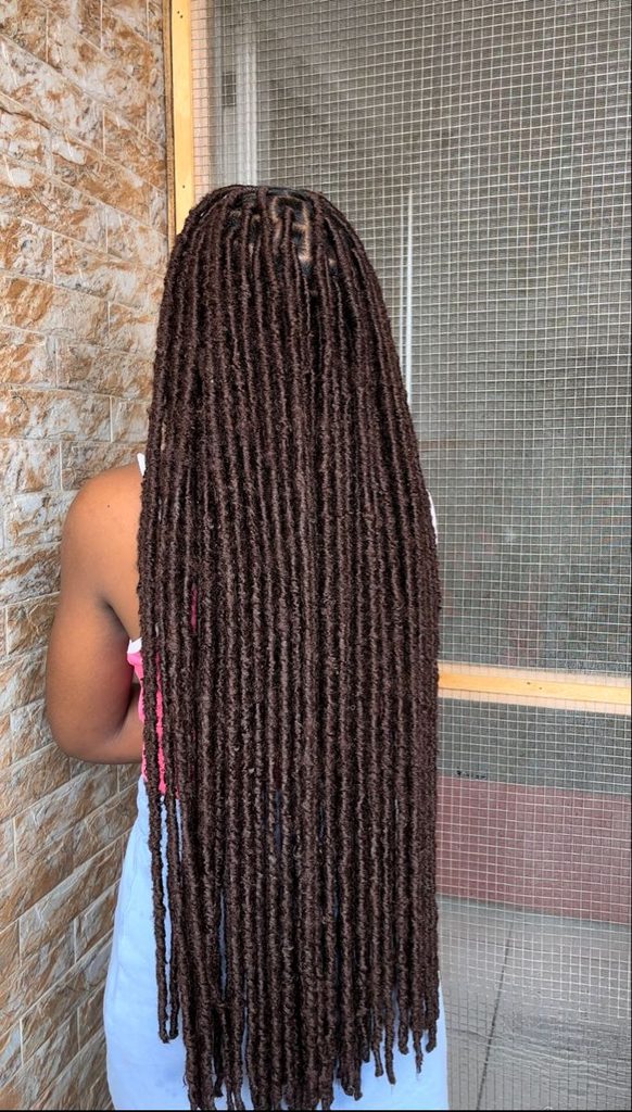 someone with faux locs protective styles