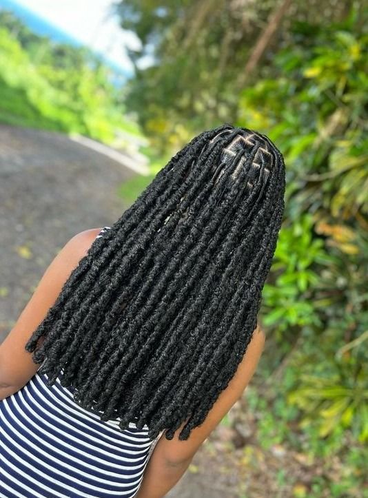 someone with faux locs afro hairstyles