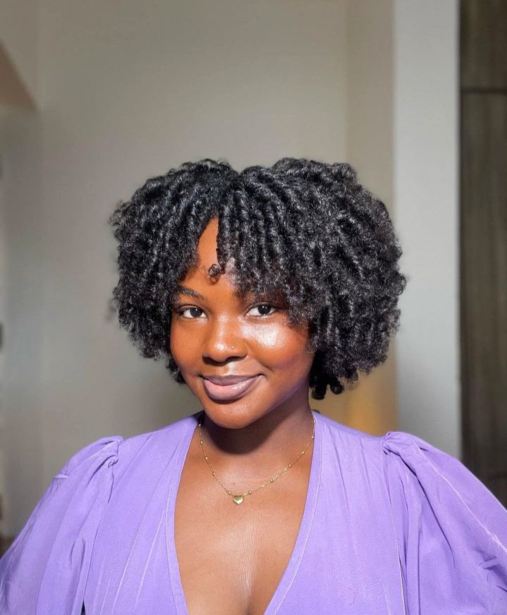 someone with finger coils afro hairstyles