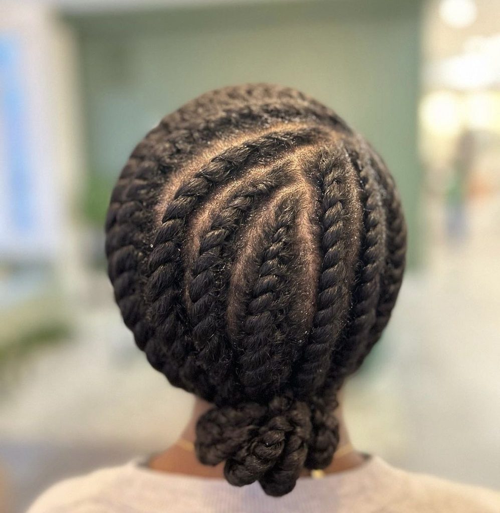 someone with flat twist updo