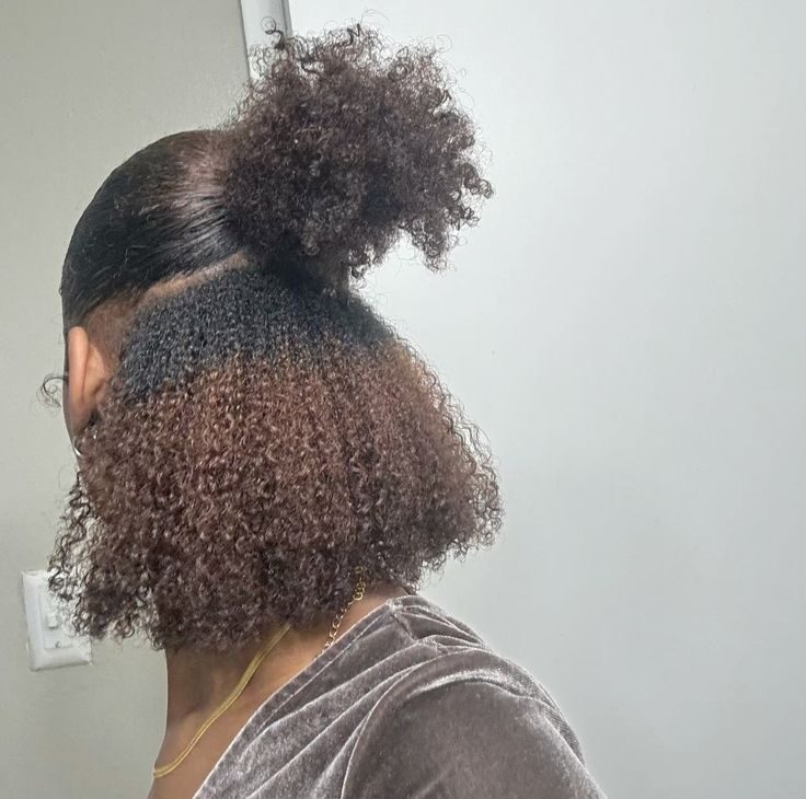 someone with half up with curls down