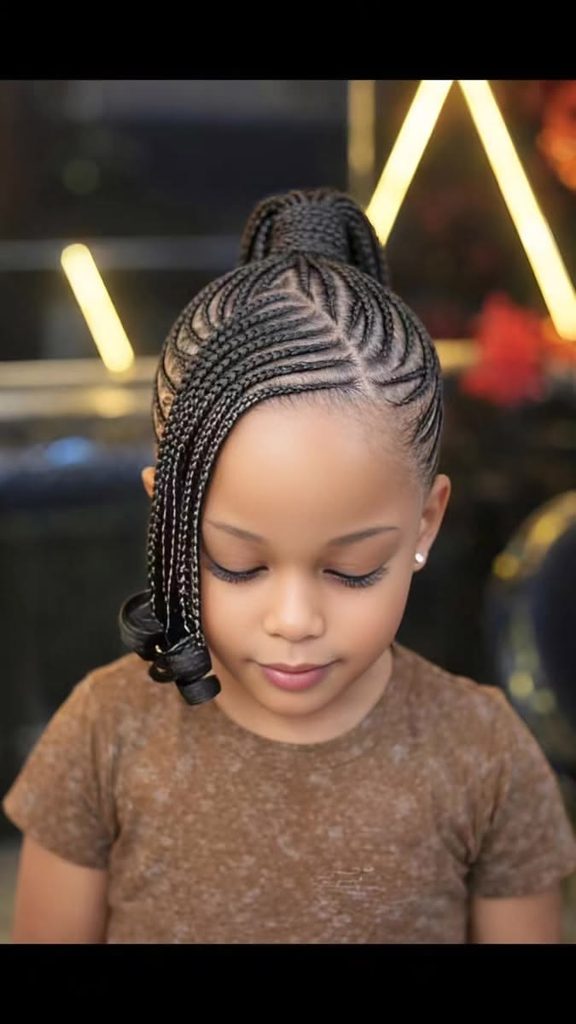 kid with cornrow style