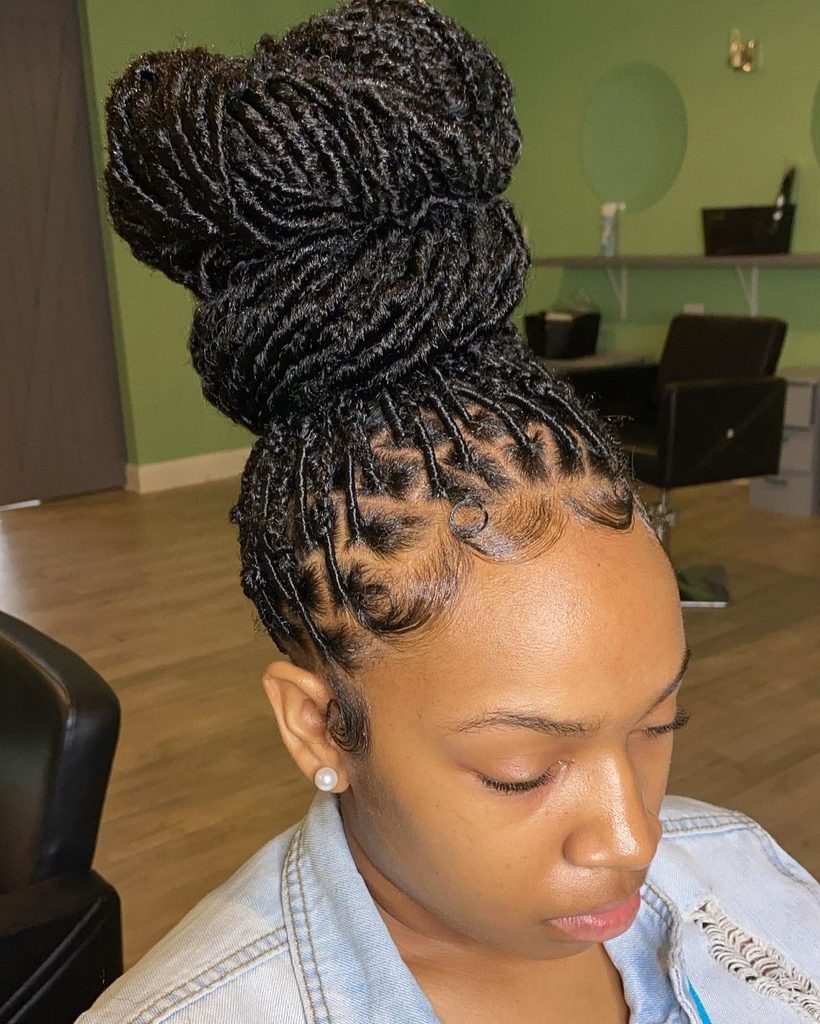 someone with loc bun