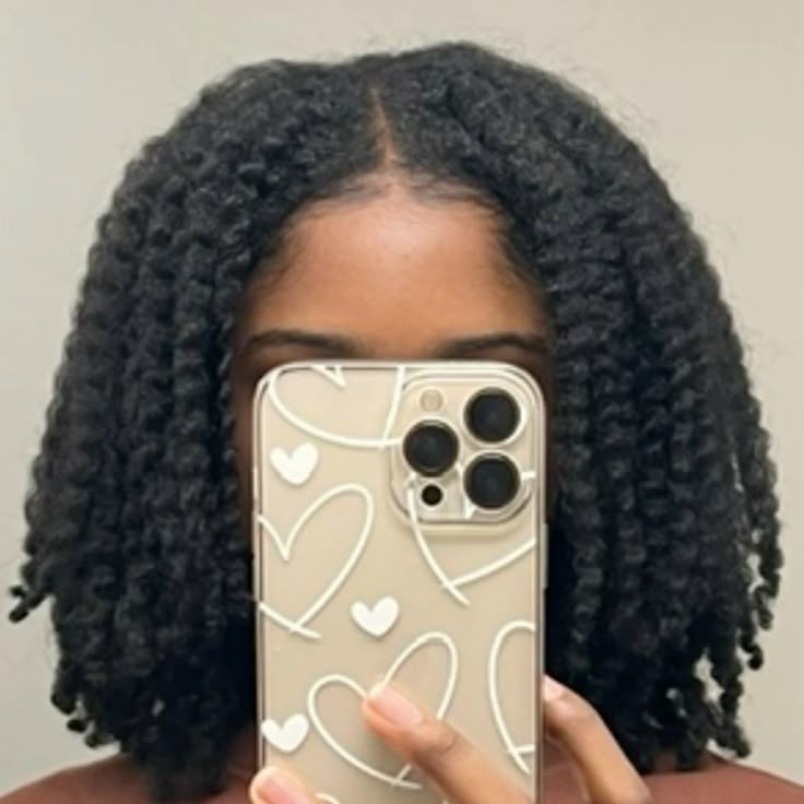 someone with picked out twist out