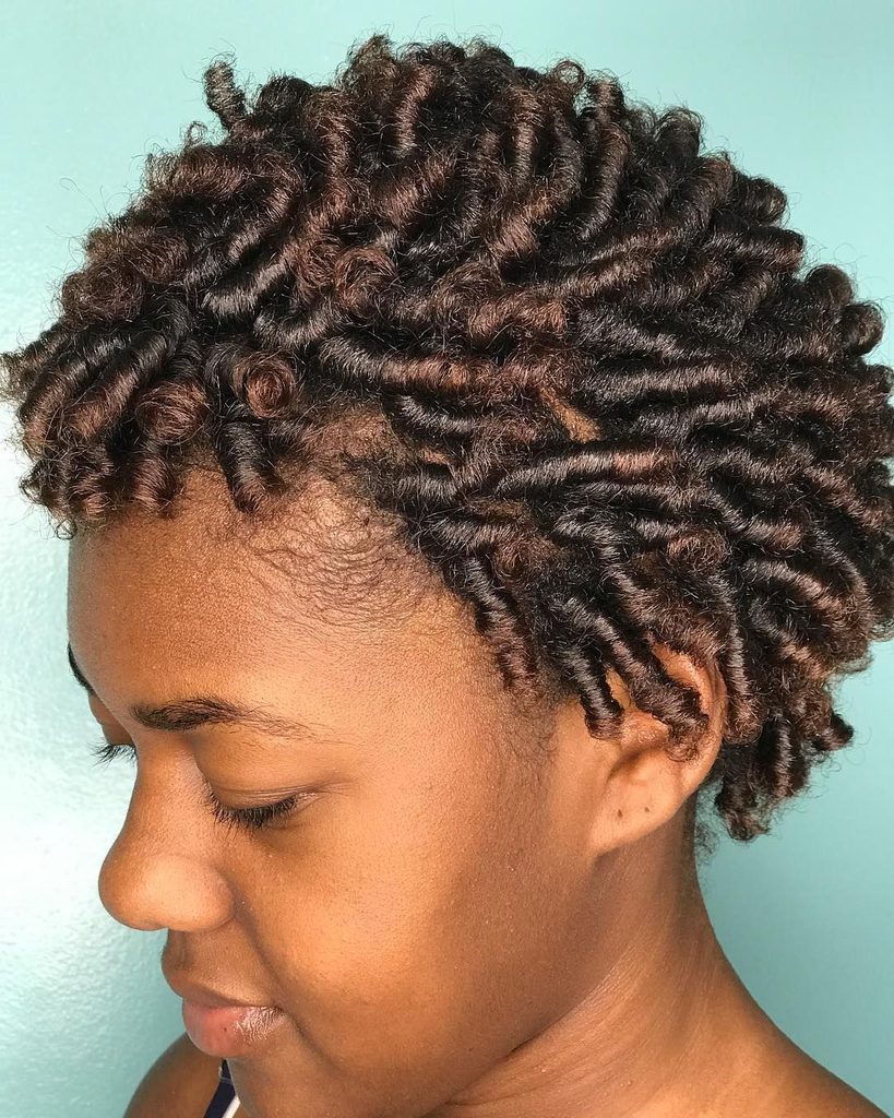 someone with finger curl style