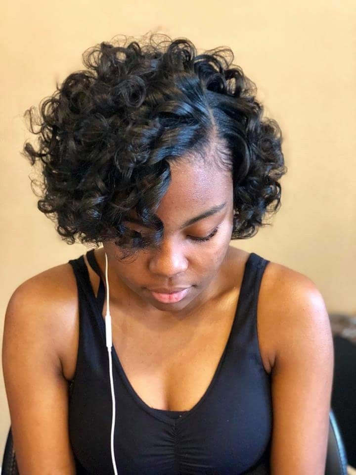 someone with roller set curls