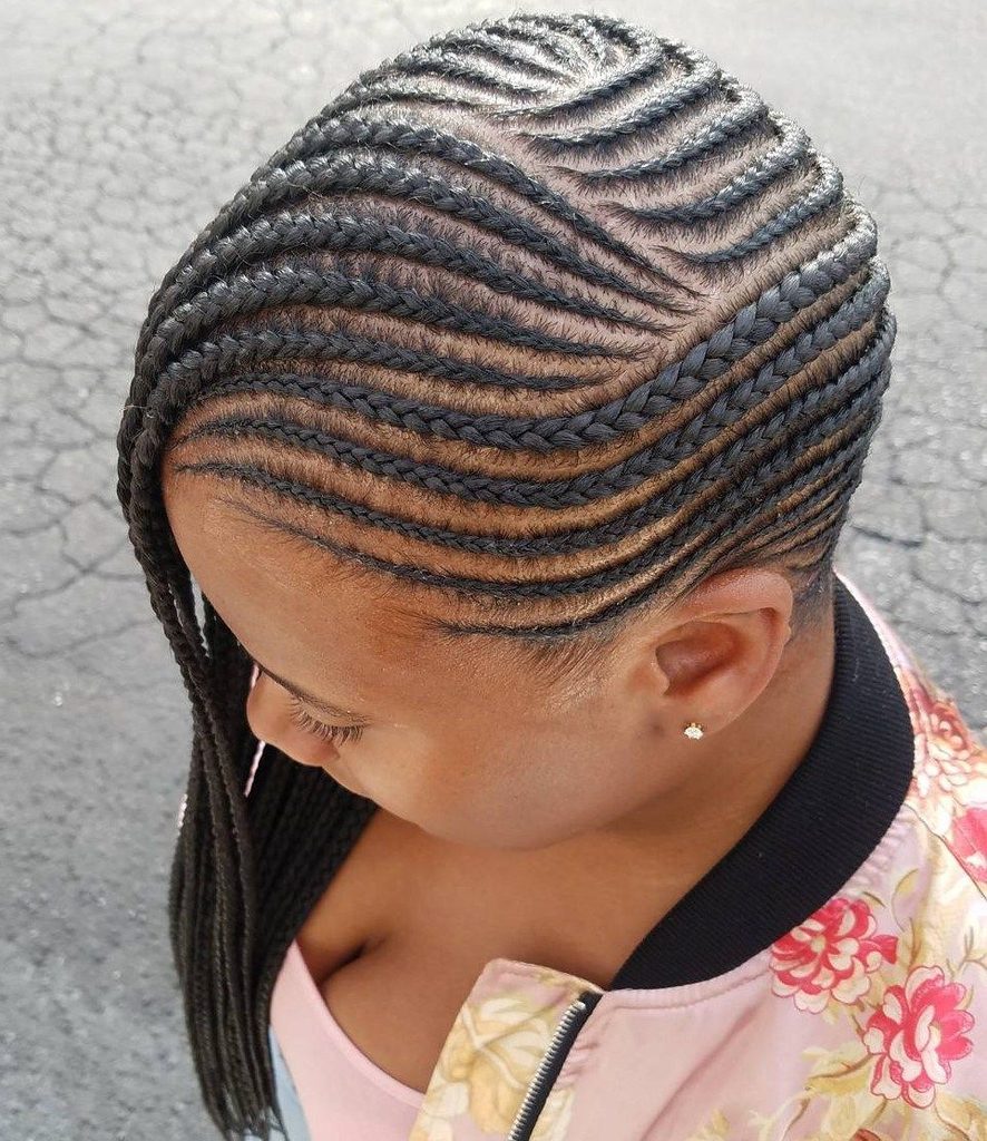 someone with side swept cornrows protective styles