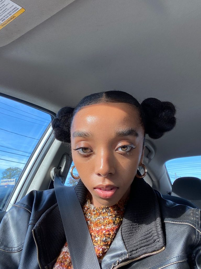 someone with space buns afro hairstyles