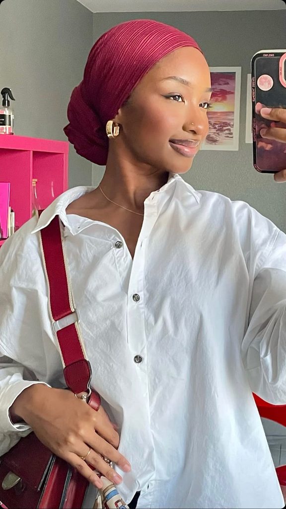 someone with structured turban for work as one of the cute headwrap styles for bad hair days
