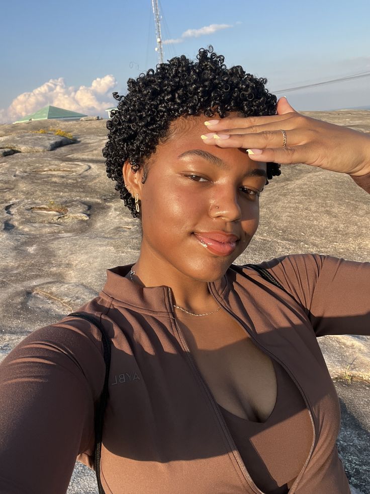 someone with TWA about to grow out a TWA
