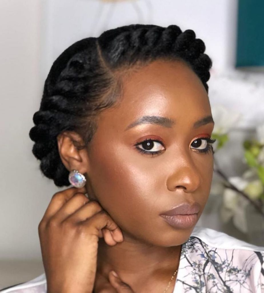 someone with twisted crown braid afro hairstyles