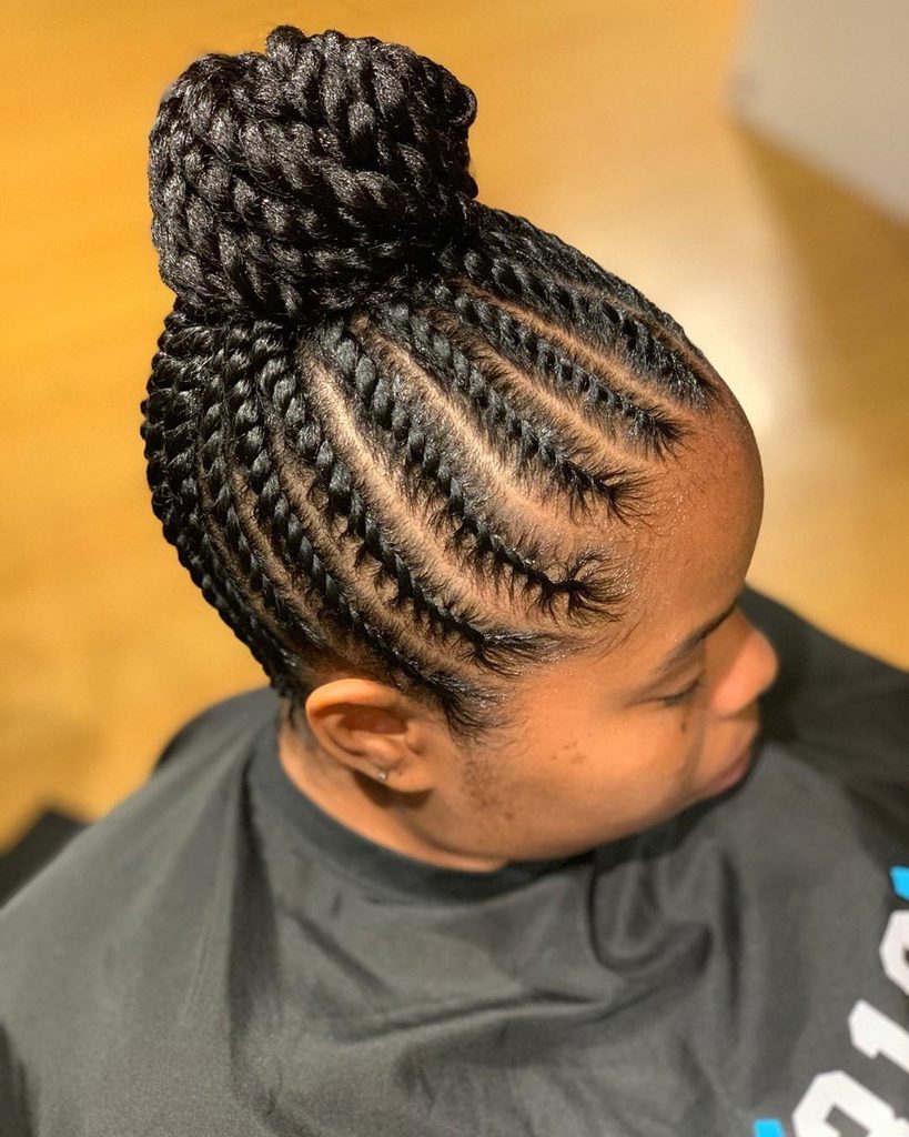 someone with twisted top knot for natural hair
