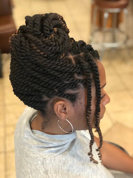 someone with twisted updo for natural hair