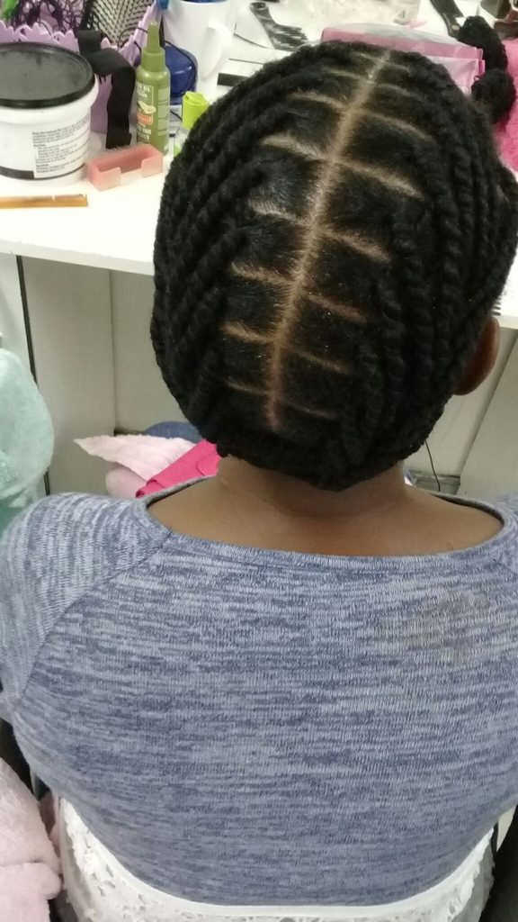 someone with twists with wrapped thread