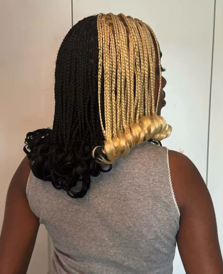 someone with two tone braided style