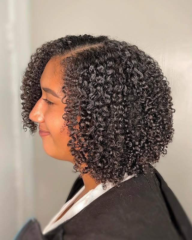 someone with wash and go curl afro hairstyles