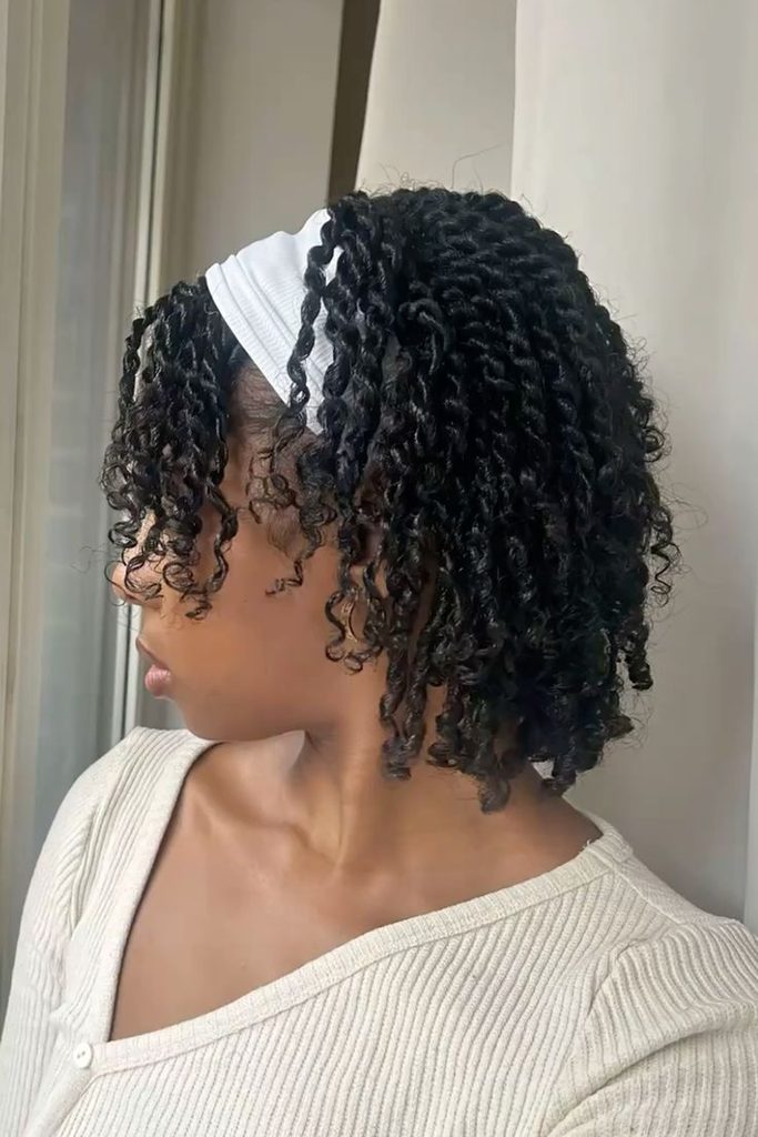someone with wrap with front twist detail as cute headwrap styles for bad hair days