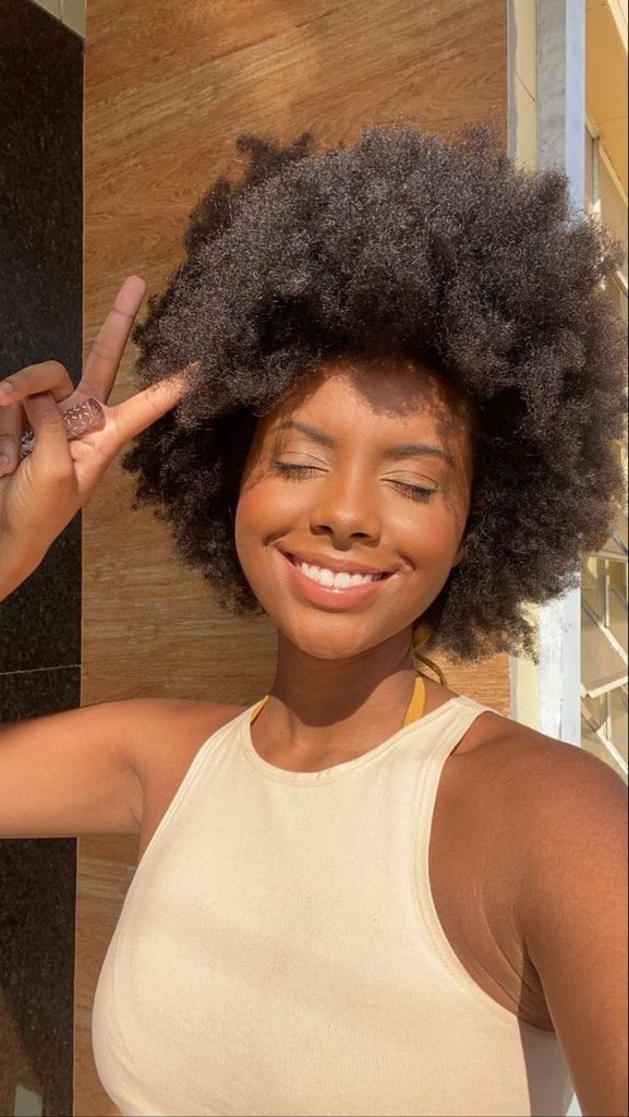 a girl with afro hair