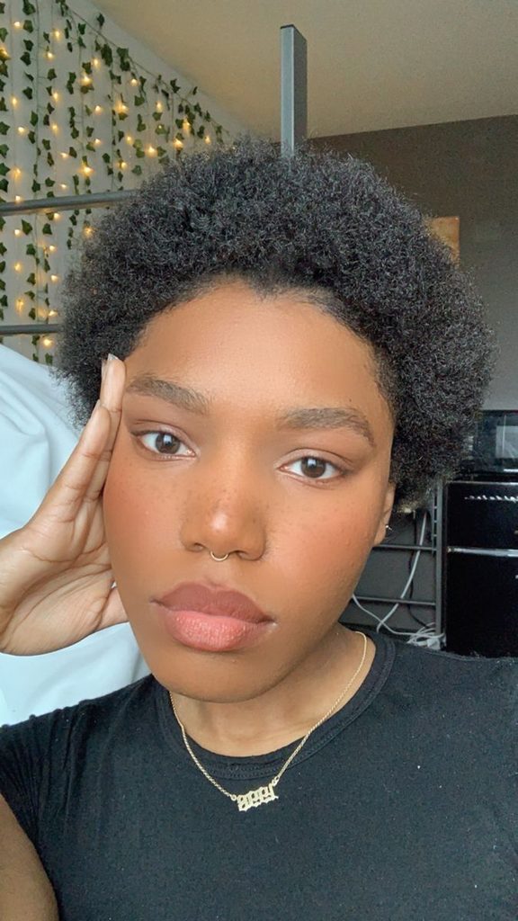 someone with a short afro