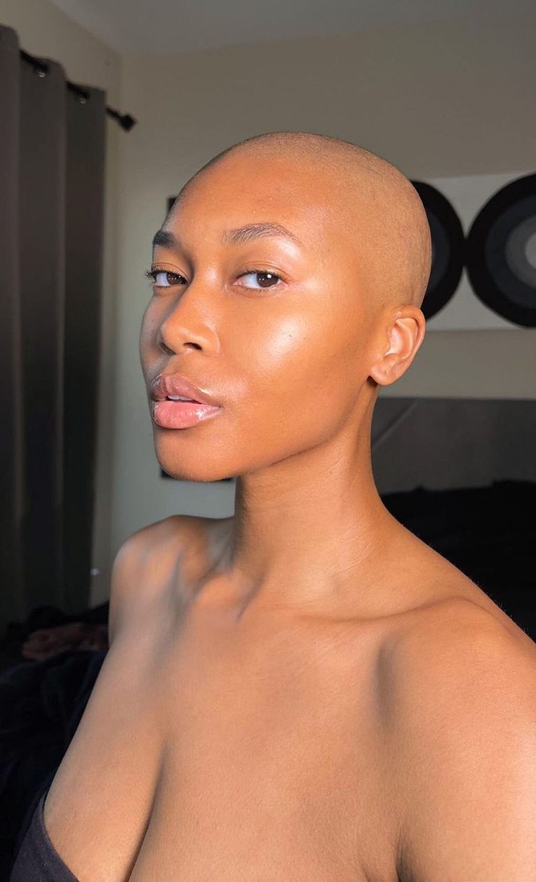 a lady with a bald head