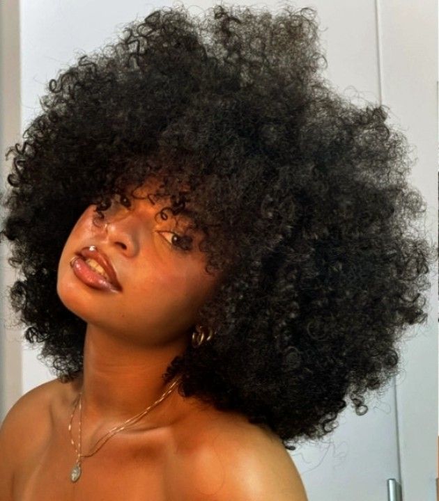 someone with a curly hair