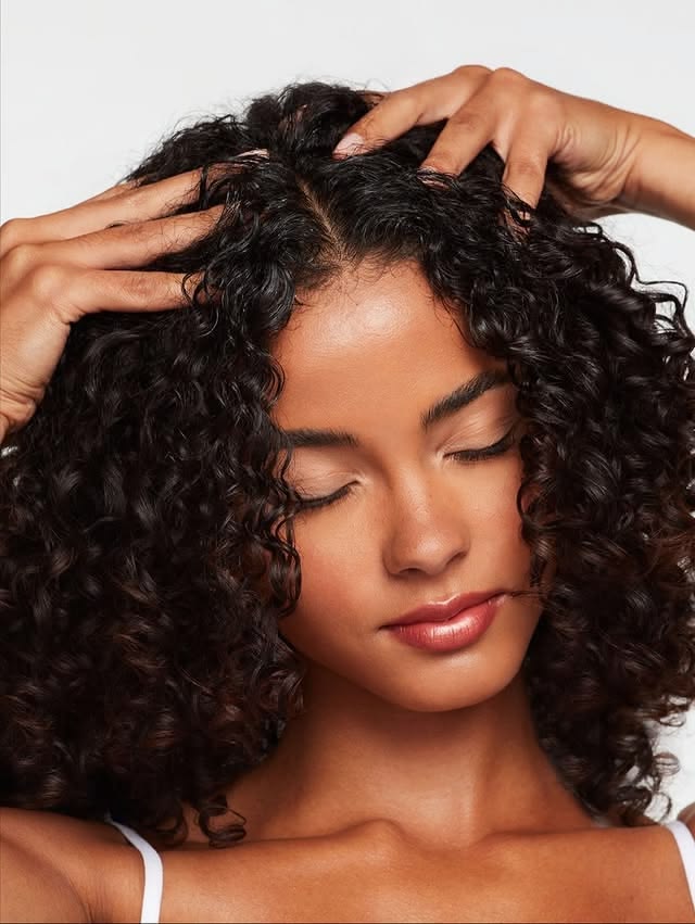 someone with curly hair