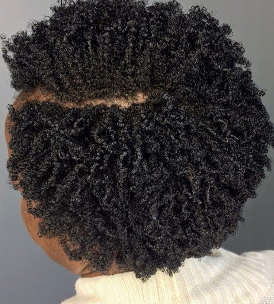 someone with a short curly hair