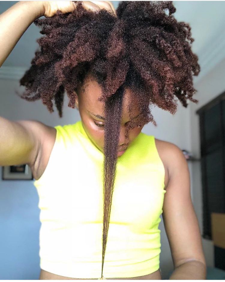 someone with elastic afro hair