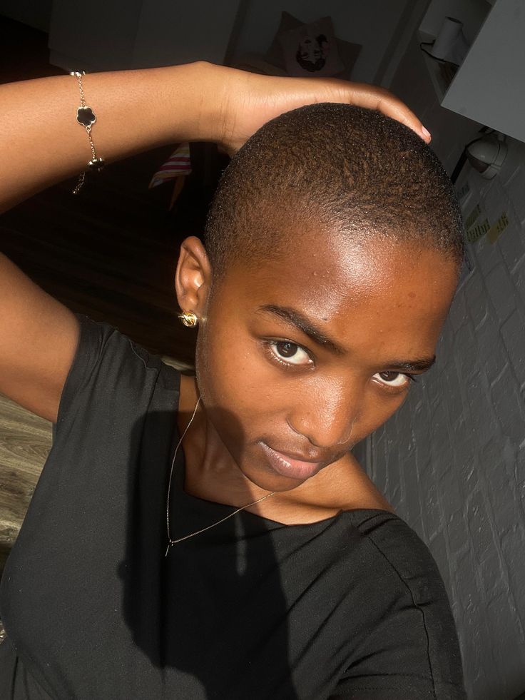 someone with a little to no hair as a stage of how hair grow