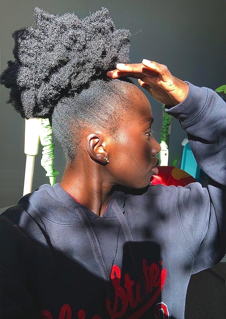 someone high puff afro hairstyles
