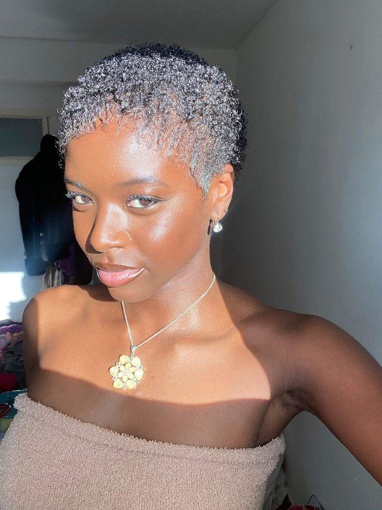 someone with moisturized twa as a way to care for a twa