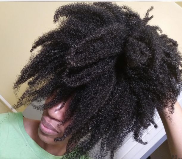 someone with a full natural hair