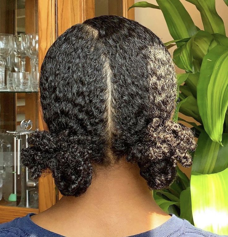 someone with a neat hair as a way to protect afro hair from humidity
