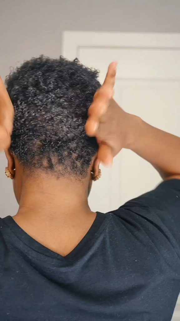 someone massaging her scalp 