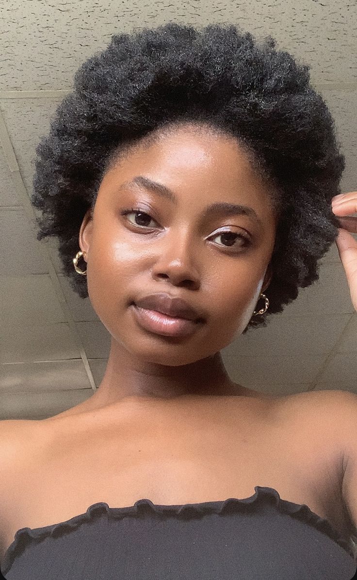 someone with a short afro hair