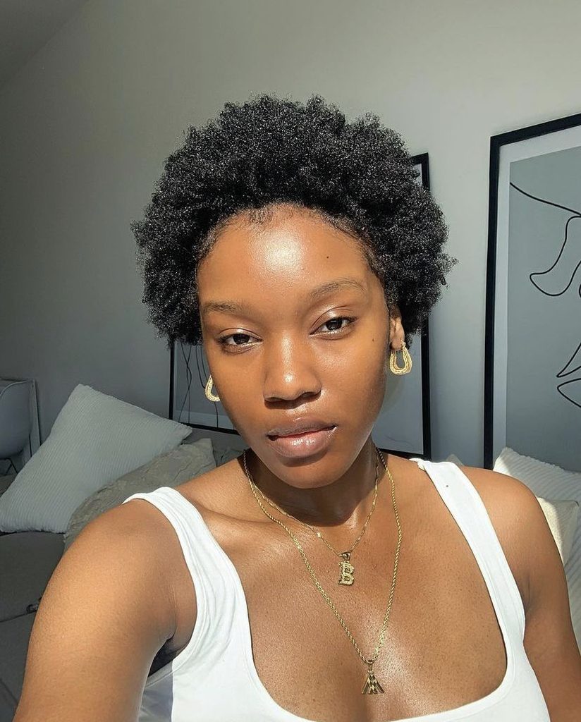 someone growing out a TWA into afro hair