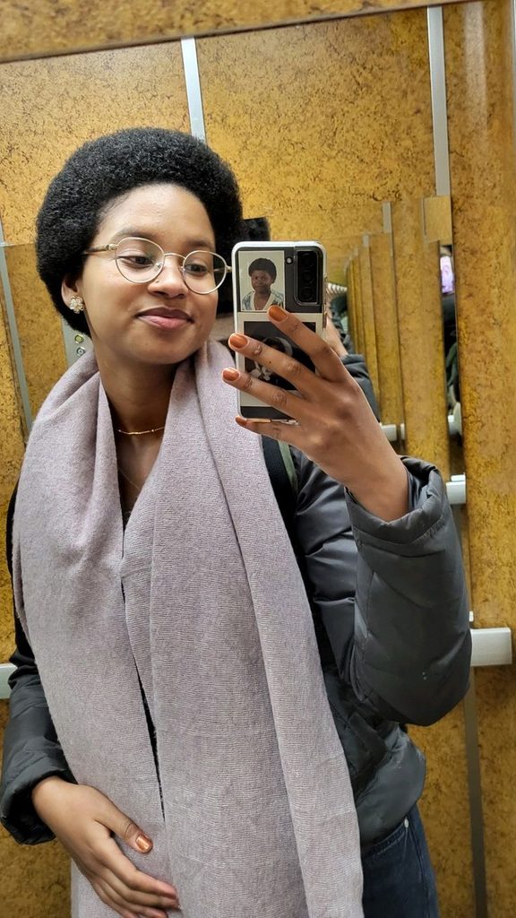 someone with a short afro hair