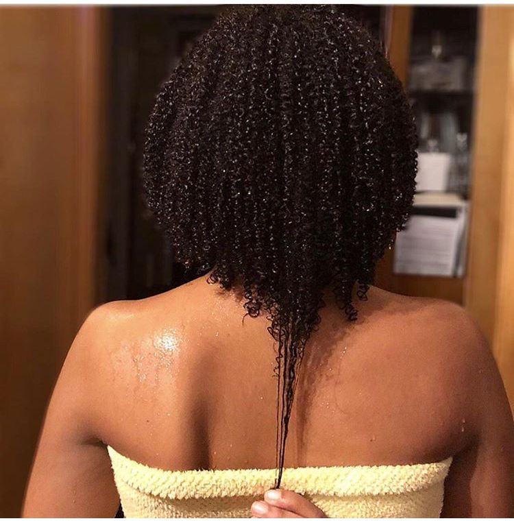 someone with a curly hair