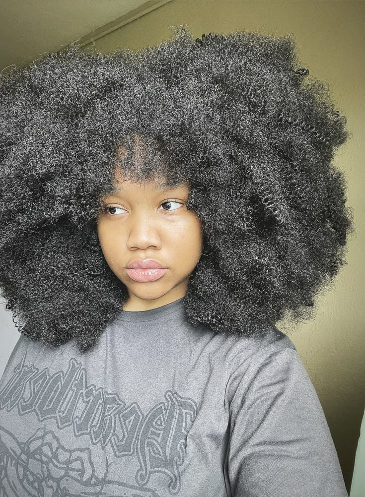 someone with a full afro hair