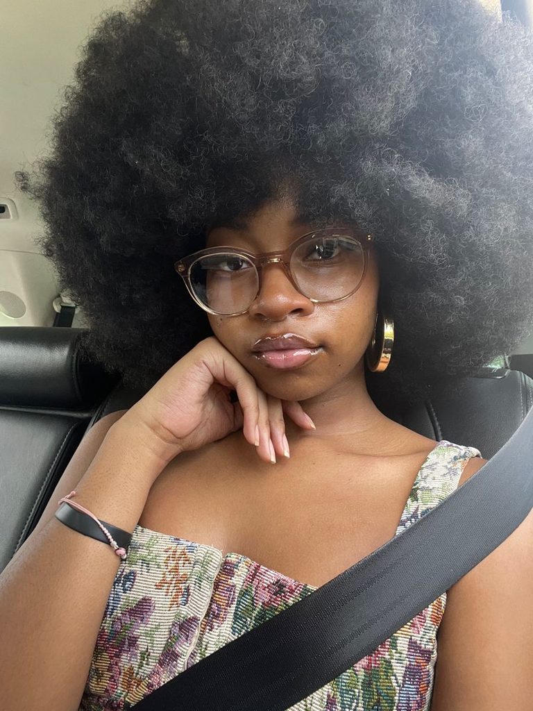 someone with full afro hair