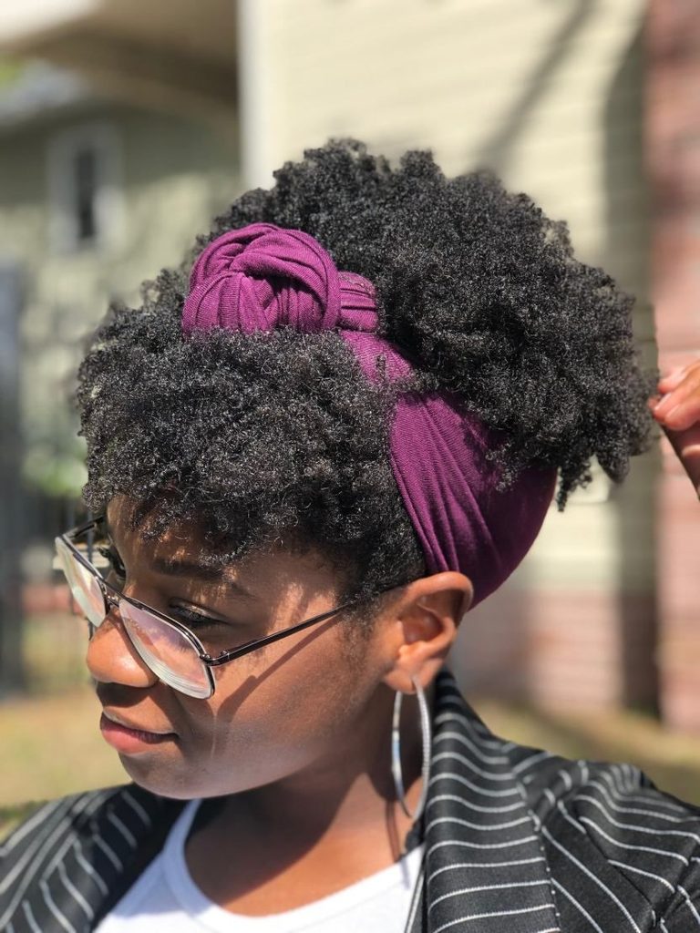someone that carried her hair up with hair scarf