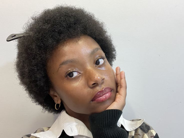 someone with short afro hair