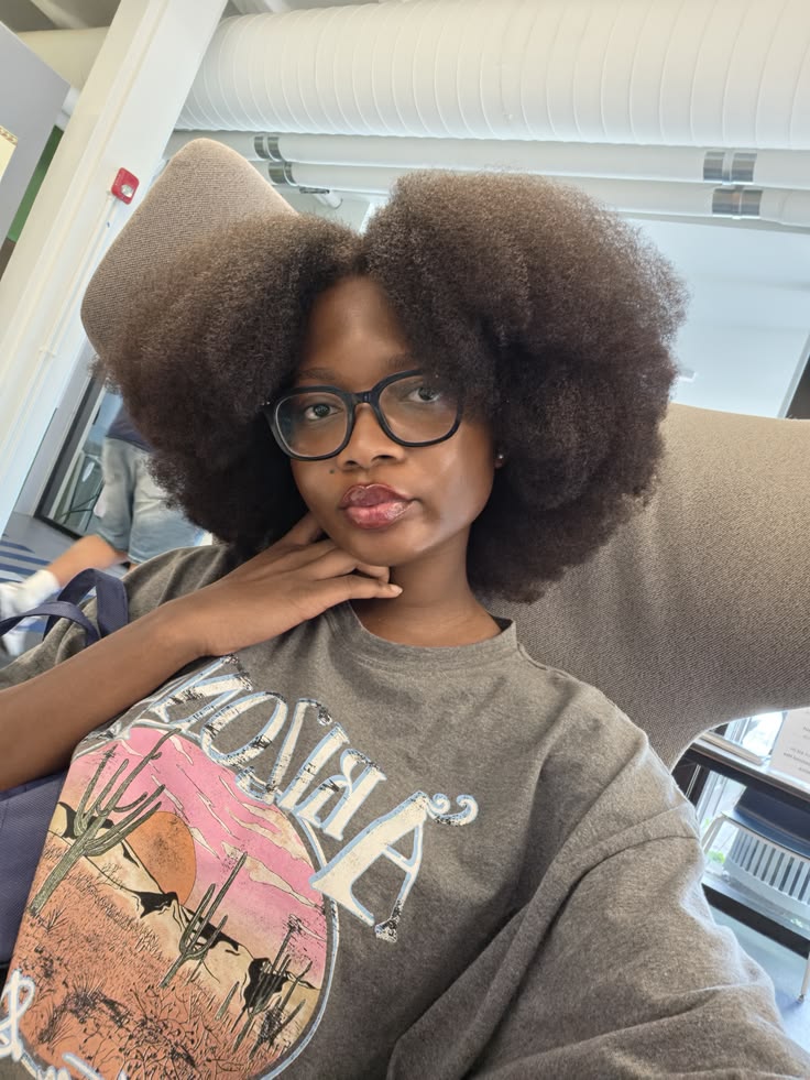 someone with soft afro hair