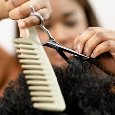 someone getting her hair trimmed